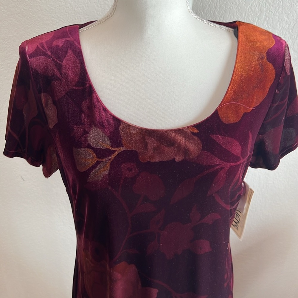 Vintage velour, long dress that  has a gorgeous plum/orange floral pattern.